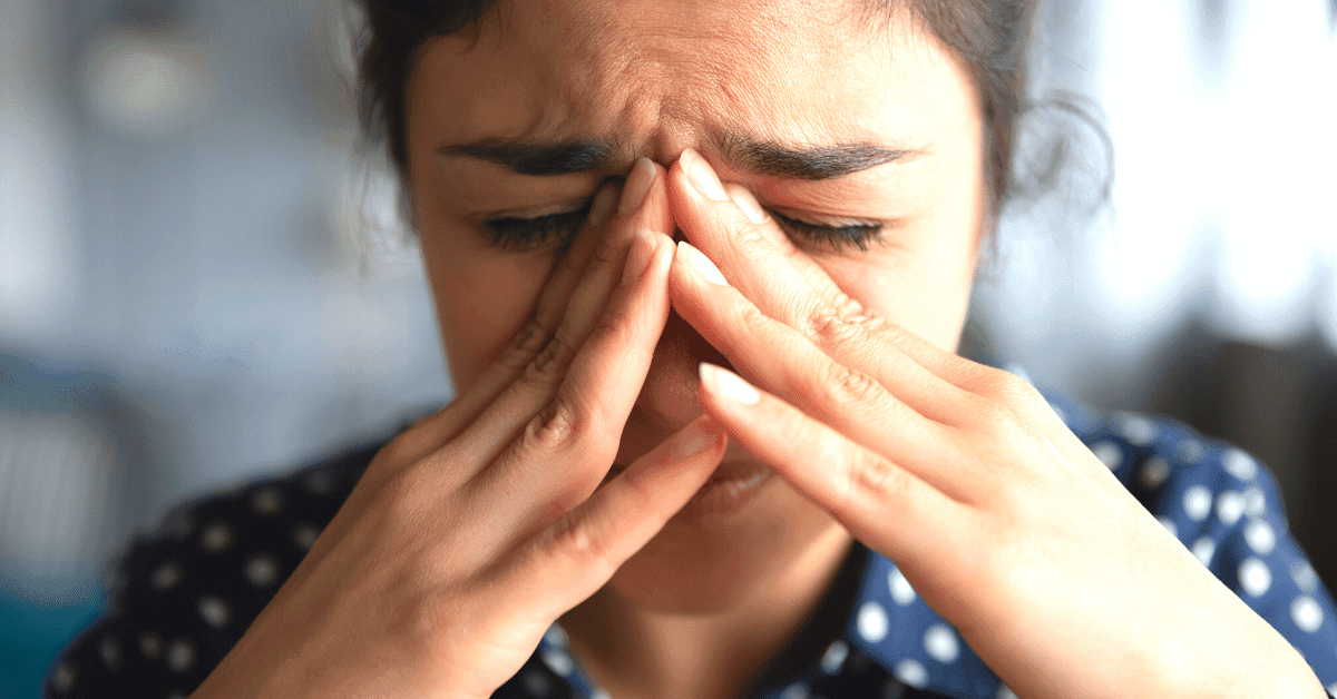 A woman is upset and looks like she is crying